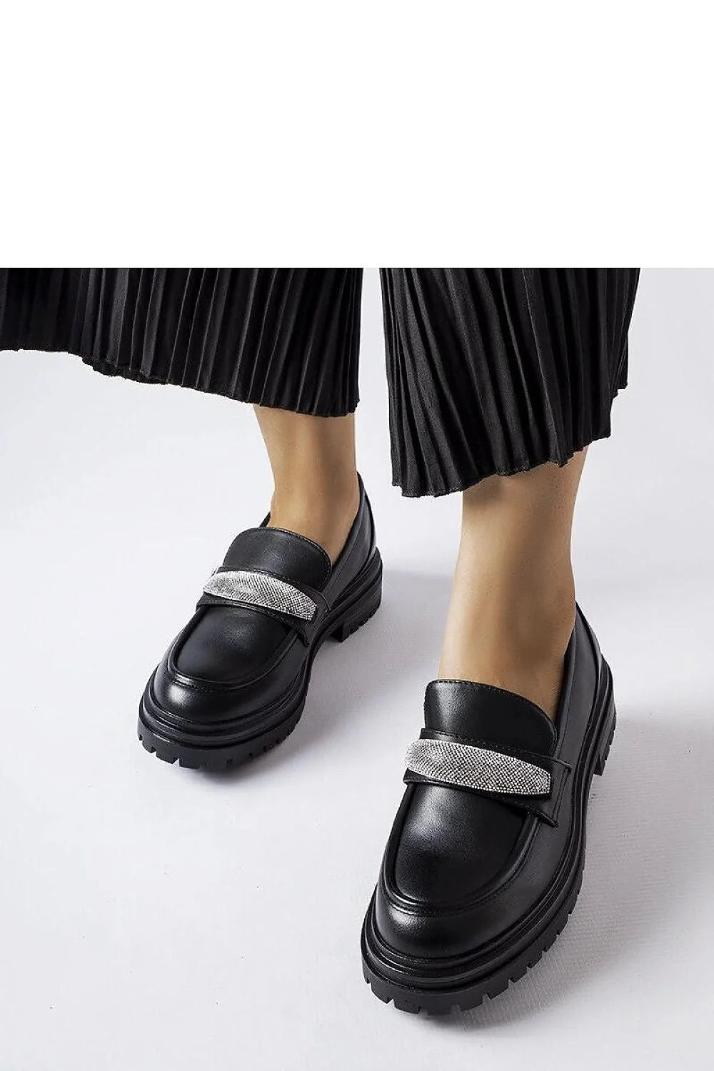 mocassins femme cuir noir semelle épaisse crantée plateforme style urbain contemporain bride galon métallisé confort rembourrée coutures soignées élégante