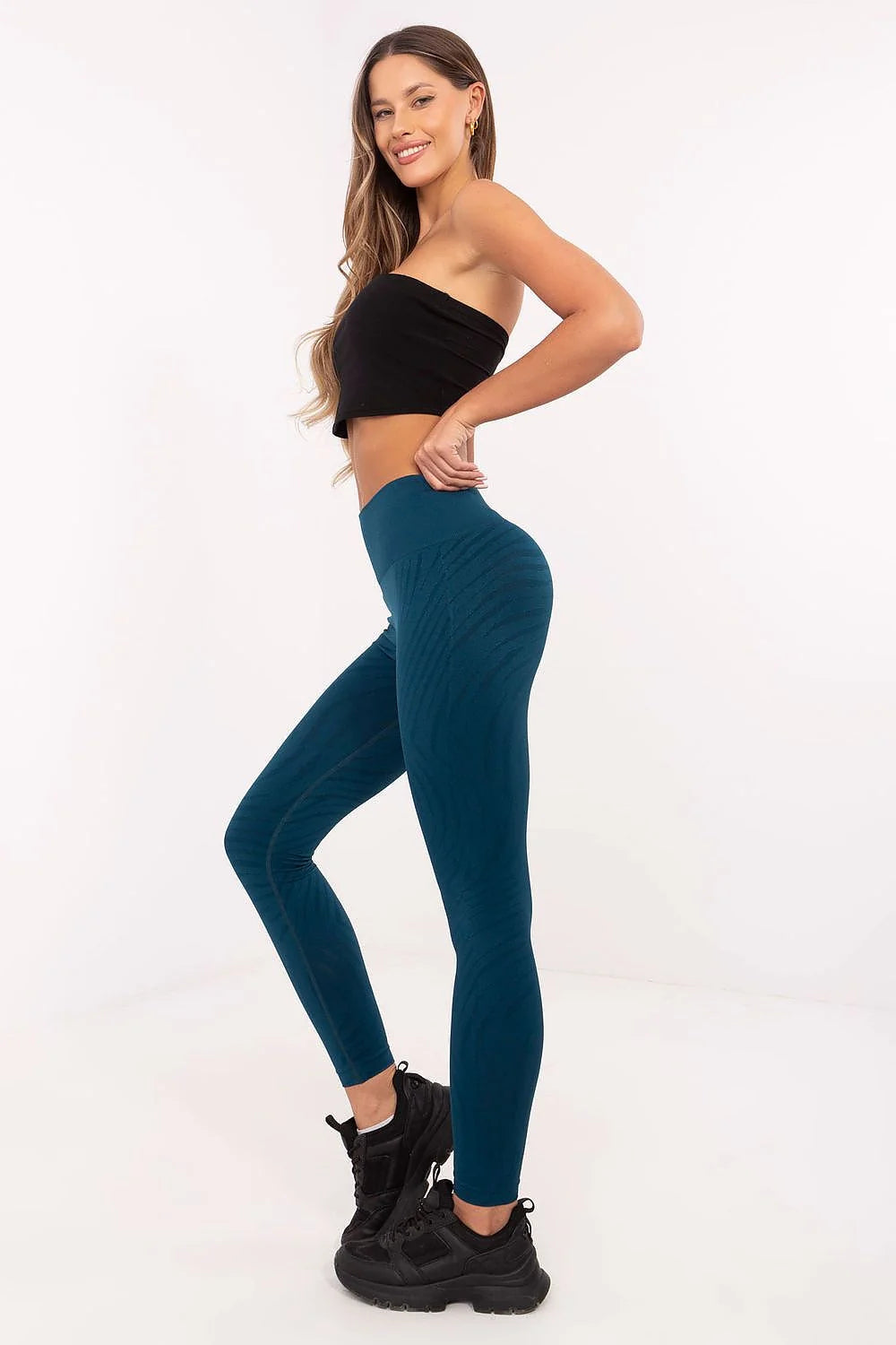 Ensemble sportif femme haute taille motif subtil tube top noir leggings bleu canard matière élasthanne confort optimal style moderne