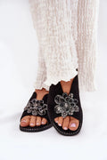 Sandales Step in style pour femmes élégance et confort suédine noire fleur scintillante talon plat