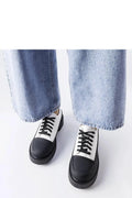 chaussures basses femme urbain bicolore noir blanc cuir écologique confortable lacets semelle crantée plateau derby minimaliste durable maintien
