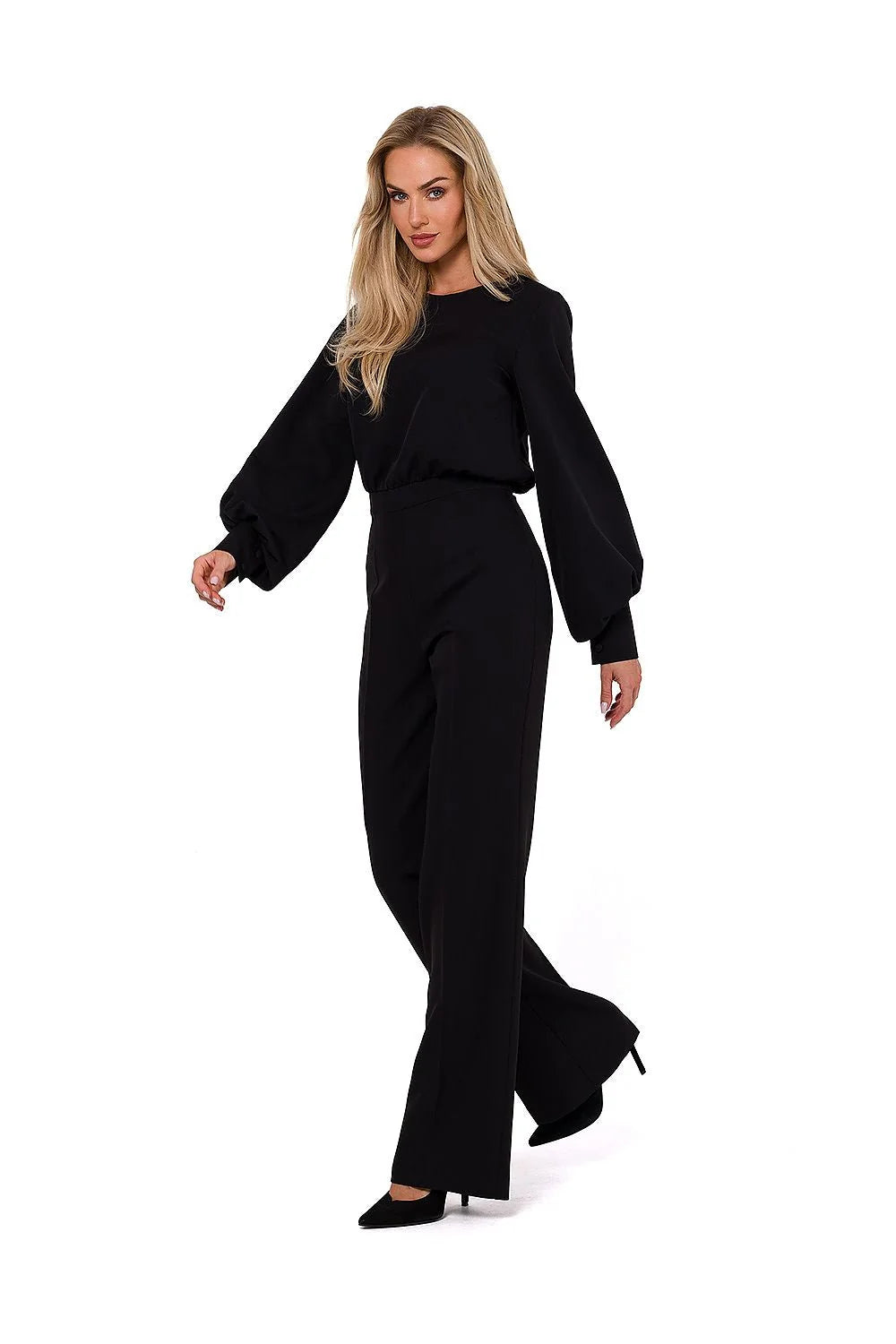 combinaison noire élégante minimaliste manches bouffantes longues poignets resserrés encolure ronde taille cintrée ceinture intégrée jambes larges fluide