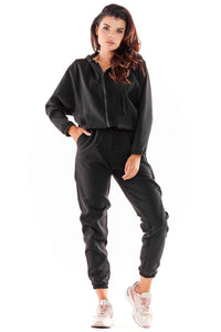 Survêtement polyester élasthanne noir veste capuche zippée pantalon jogger taille élastique coupe ample manches longues col rond style