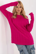 Pull pour femme à torsades coloris fuchsia loose fit manches longues col rond longueur mi-haute