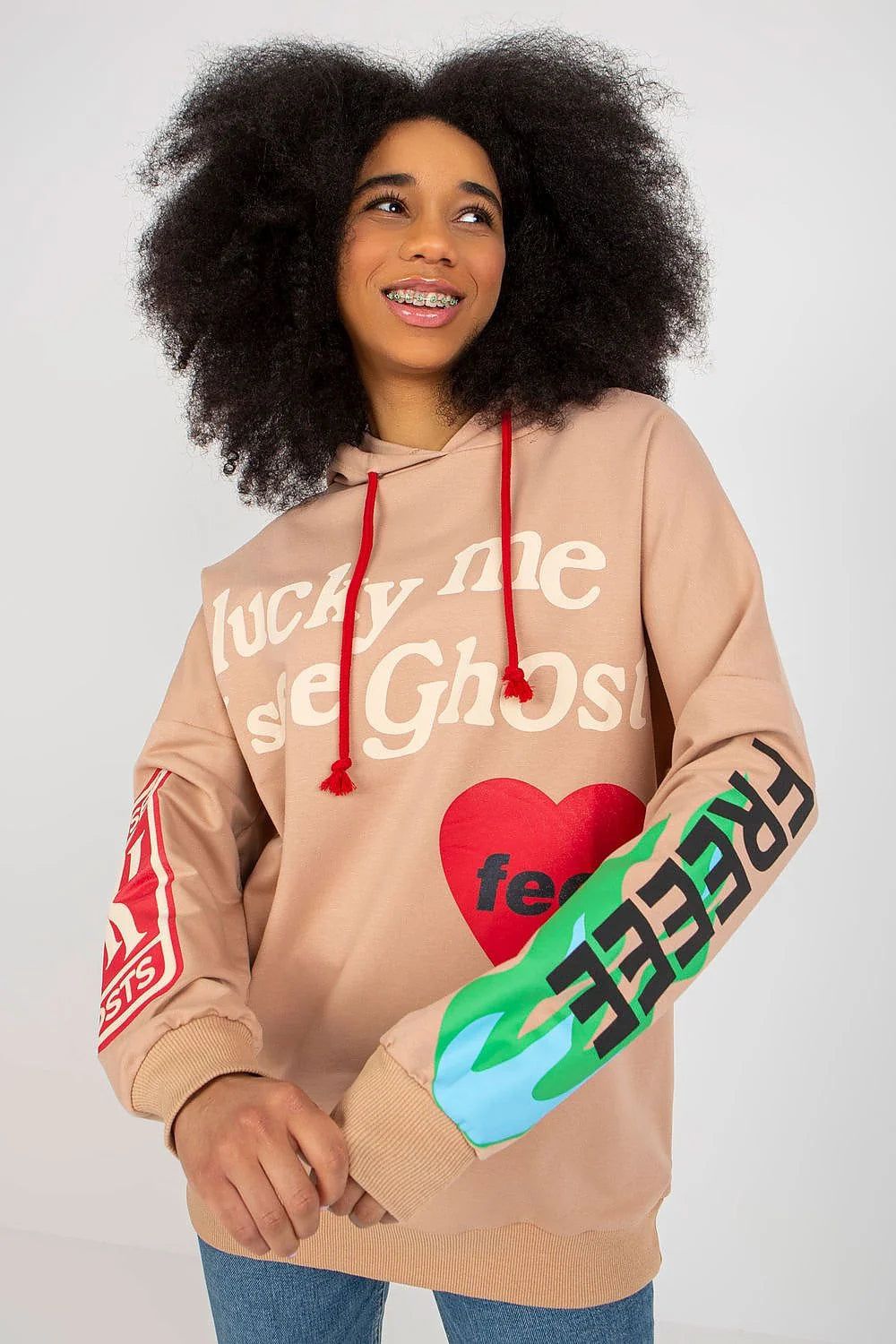 Sweatshirt Fancy Femme Streetwear Coupe Oversize Capuche Manches Longues Imprimés Élégants Tissu Doux Confort Mode Urbaine