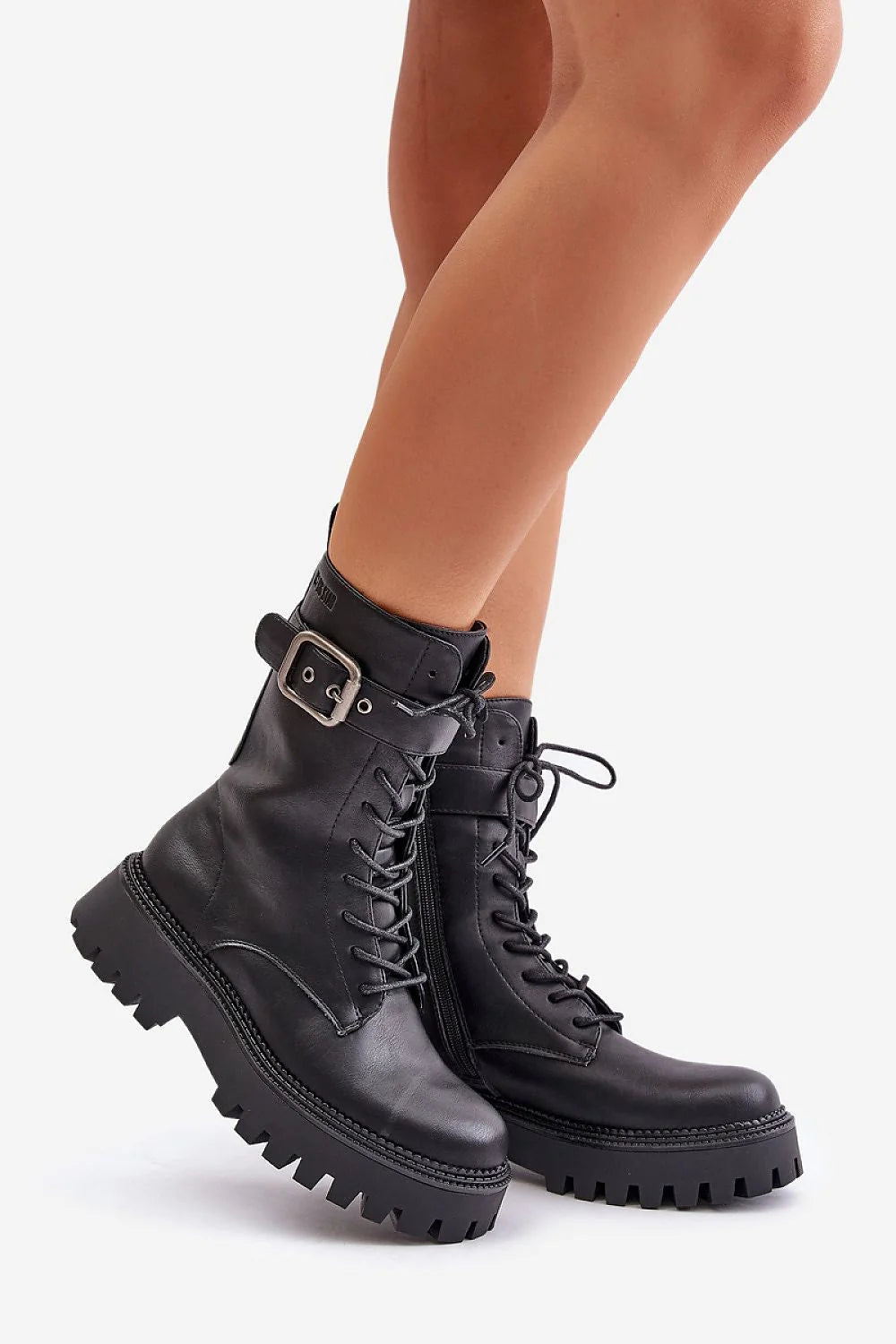 Bottes noires mi-mollet cuir synthétique style militaire robustes lacets boucle tendance femme urbaine