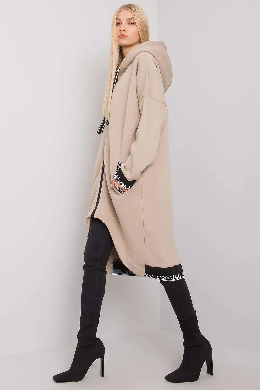 Manteau long oversize en coton décontracté beige urbain avec capuche fermeture éclair pour femmes modernes