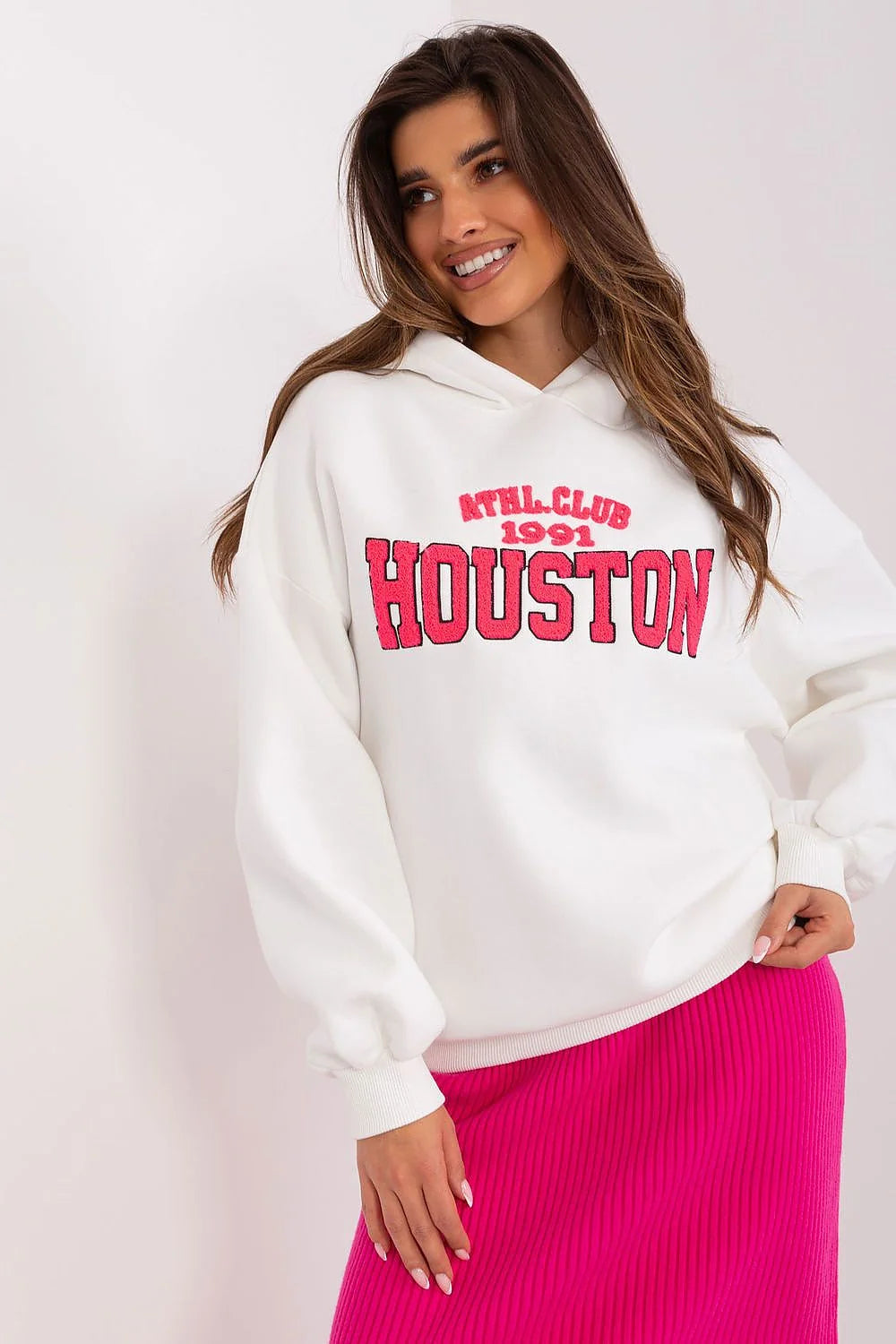 Sweatshirt femme à capuche motif ATHL. CLUB 1991 HOUSTON couleur blanche rose vif coton polyester coupe ample manches longues