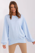 sweatshirt femme oversize col rond manches bouffantes emmanchures tombantes coupe longue décontractée bleu pastel jersey molletonné doux coutures décoratives V