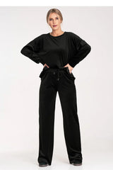 ensemble lounge femme velours noir satiné oversize manches longues pantalon large taille élastique cordon poches latérales longueur pleine cosy chic