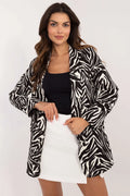 Veste femme blazer motif zébré noir blanc élégante coupe structurée épaules définies manches longues sans fermeture