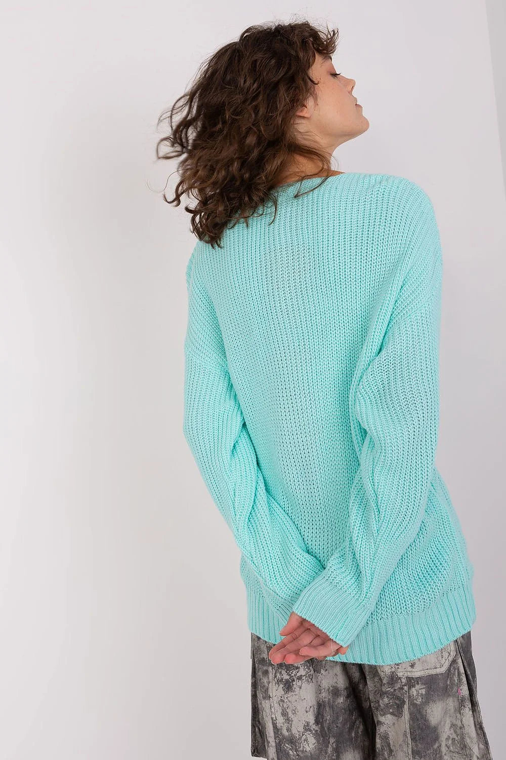 Pull maille femme design twisté turquoise pastel encolure V profond manches longues côtelé casual chic