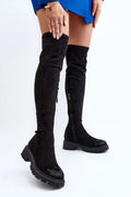 Bottes cuissardes éco-suède noir moderne audacieuses semelles crantées fermeture éclair silhouette élancée femmes style