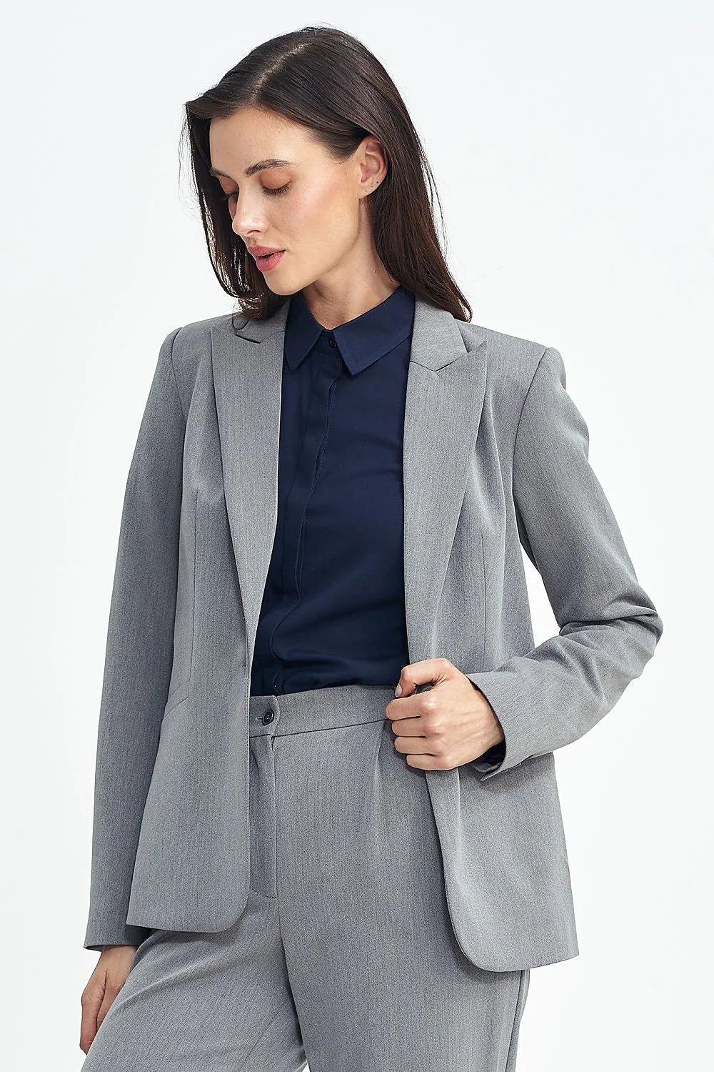 Blazer femme élégant gris clair taille ajustée style professionnel col à revers manches longues poches revers femmes