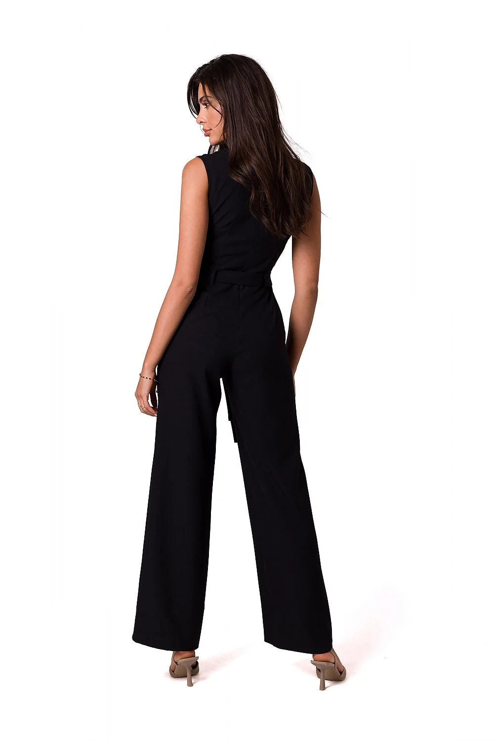 Combinaison élégante sans manches pour femme, design moderne, ceinture à nouer, poches latérales, tissu léger, couleur rose pâle, taille ajustable, occasion多様