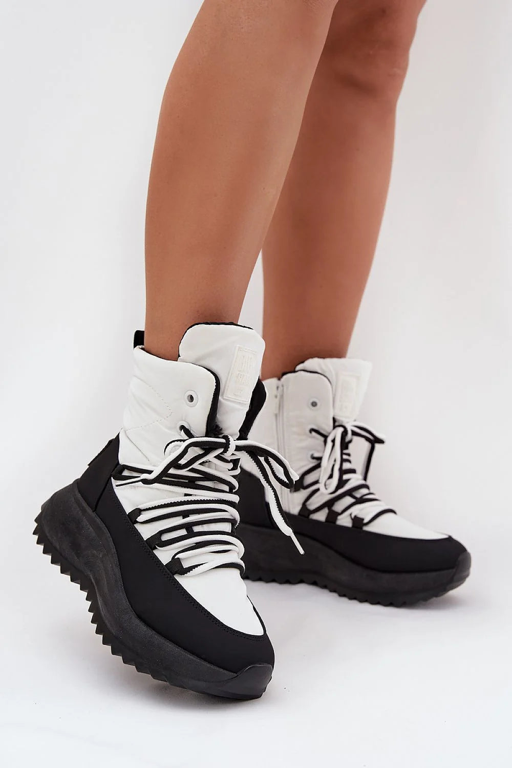 bottes neige BigStar chaudes fourrure doublure semelle plateforme crantée isolation thermique matelassée bicolore noir blanc lacets zippée maintien confort urbain