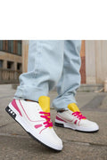 baskets femmes solea blanches accents fuchsia lacets rose vif languette jaune semelle épaisse noire cuir synthétique