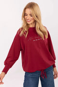 chemisier oversize bordeaux manches bouffantes col rond laçage bas rivets lettrage strassé molleton coton elasthanne poignets côtelés coupe droite courte