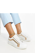 Sneakers femmes blanches dorées design moderne basse lacets métalliques cuir synthétique confortable occasion urban chic