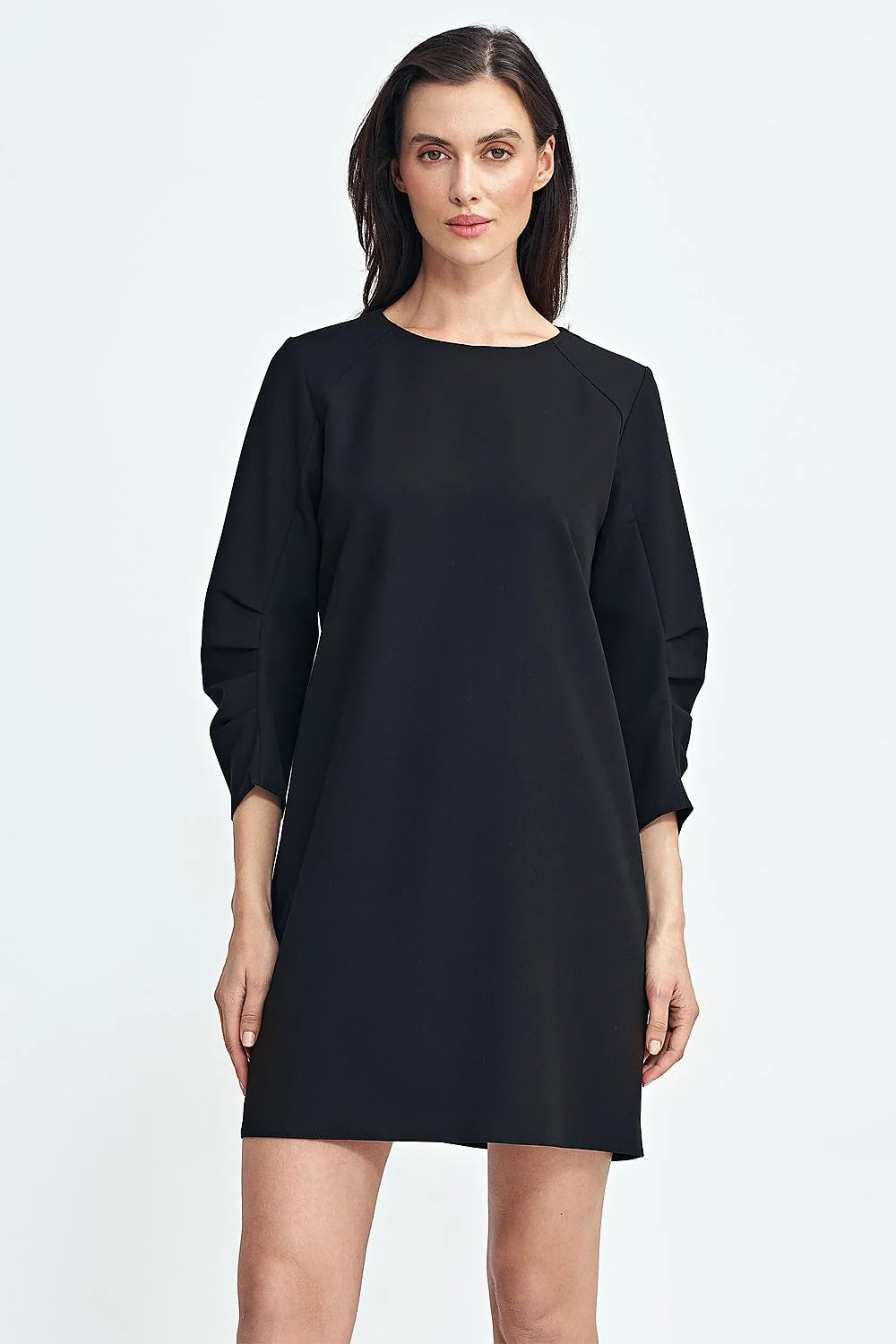Robe de jour élégante pour femme en tissu polyester minimaliste manches longues encolure ronde finitions soignées couleur noire