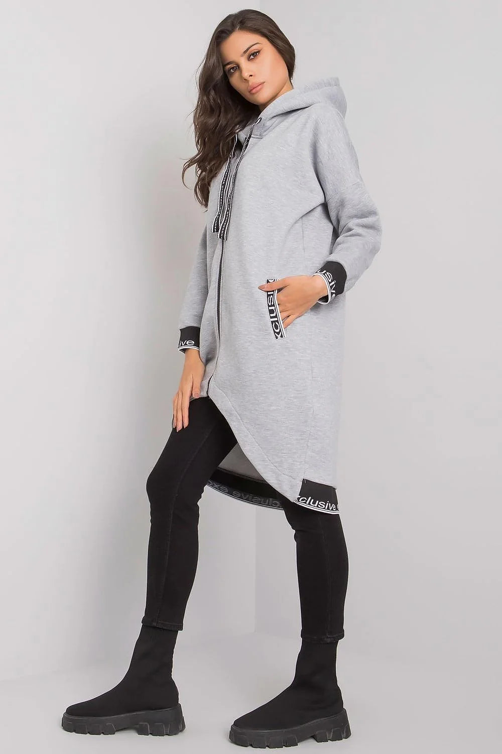 Manteau long oversize en coton décontracté beige urbain avec capuche fermeture éclair pour femmes modernes