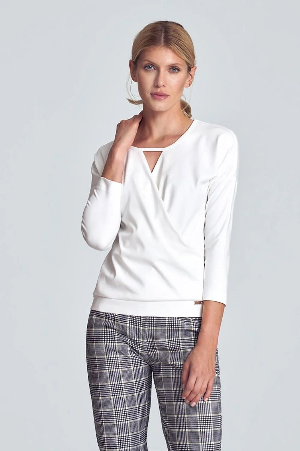 Haut féminin blanc en polyester viscose élégant manches longues encolure V pour look chic