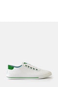 Sneakers basses pour femmes cuir perforé blanc détails verts style moderne confortable occasion quotidienne