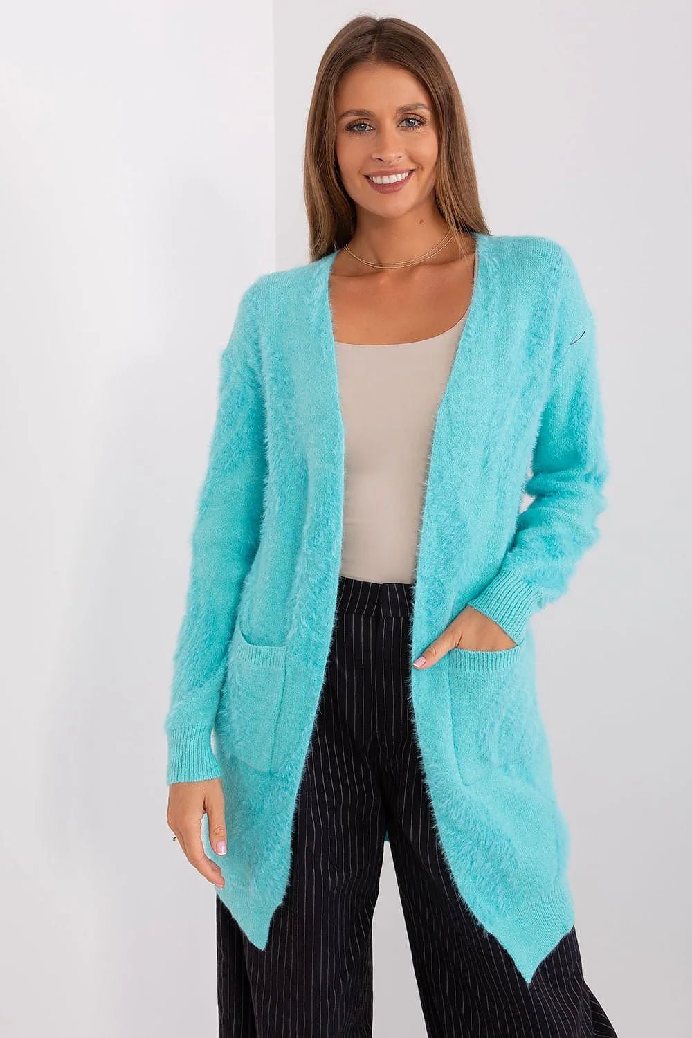 Cardigan moderne pour femme en matériau doux couleur bleu clair sans fermeture manches longues poches coulissantes coupe longue