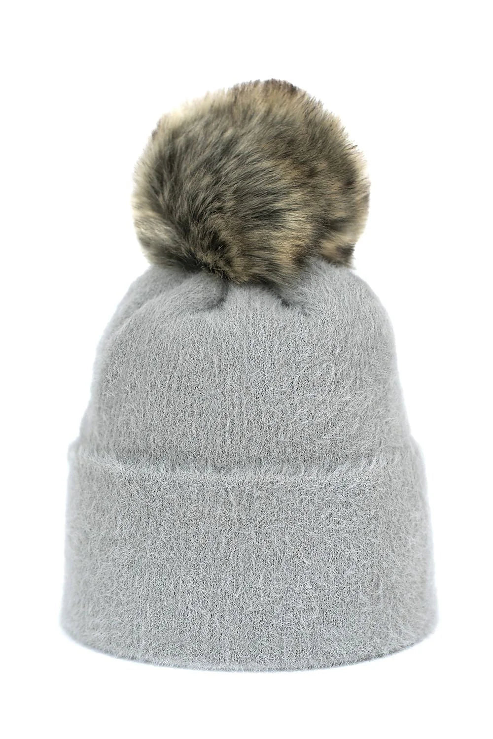 Bonnet en maille tricoté gris avec pompon fausse fourrure tendance pour hiver femmes élégantes