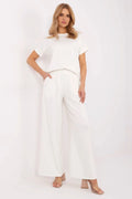 ensemble féminin survêtement blanc palazzo pantalon taille haute col rond manches courtes jambes larges plis discrets poches latérales