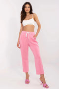 Crop top et pantalon survêtement Italy Moda, rose vif, blanc, tissu extensible, coupe ajustée, mode décontractée, loungewear chic, pantalon droit, femme