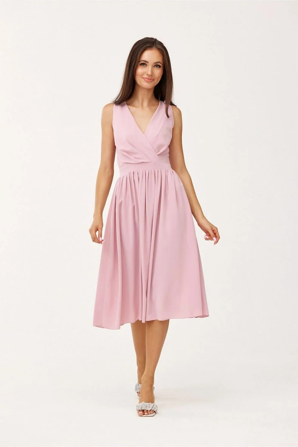 Robe de cocktail élégante cache-cœur sans manches taille cintrée jupe évasée couleur rose pâle polyester 100% femme