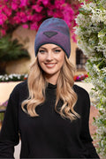 Bonnet d'hiver élégant couleur turquoise logo éco-cuir effet couleur extraordinaire largeur revers front femme
