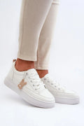 Baskets pour femmes style contemporain en matériau synthétique blanc beige confortable lacets métalliques détails décoratifs