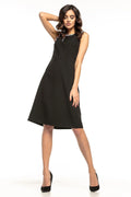 Robe midi en coton noir élégante et évasée, idéale pour bureau et sorties décontractées