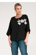 Chemisier pour femme élégant décontracté coupe ample manches mi-longues motif floral fleurs blanches noires tissu doux
