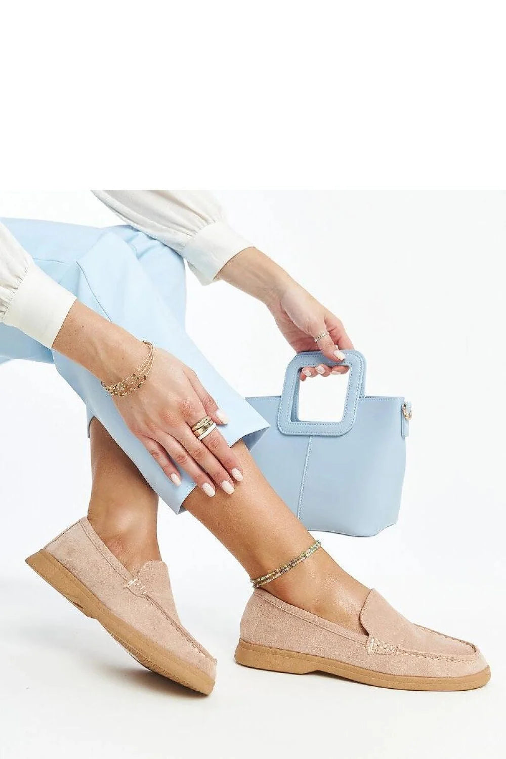 Mocassins femmes élégants cuir suédé rose pâle bout arrondi design intemporel confortable occasions variées