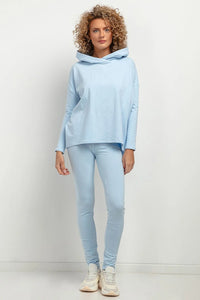 Ensemble hoodie oversize capuche manches longues tombantes leggings taille haute coton polyester bleu pâle coupe épurée style décontracté