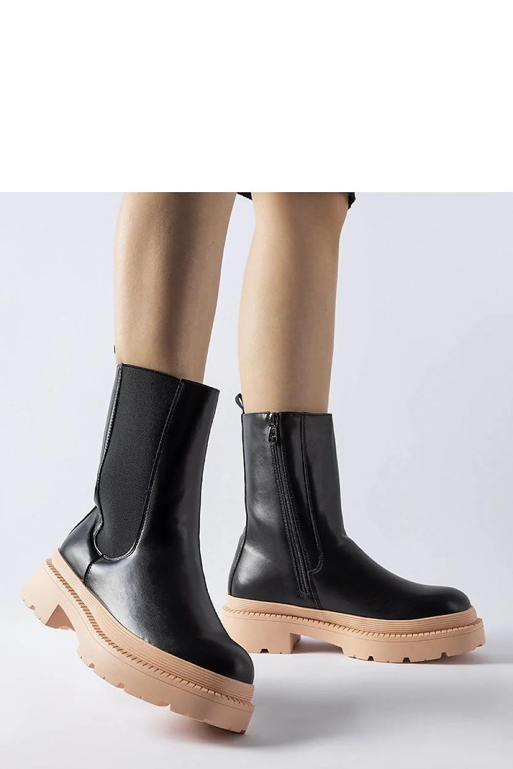 bottes femme mi mollet cuir synthétique noir semelle beige clair plateforme crantée bout arrondi fermeture éclair intérieure empiècement élastique latéral