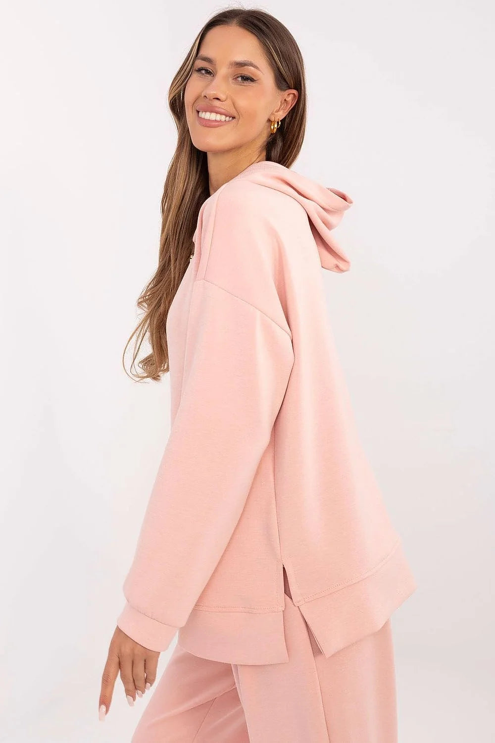 ensemble femme hoodie pantalon rose pâle coton mélangé molletonné oversize coupe décontractée capuche manches longues poignets côtelés dorés médaillons élastique