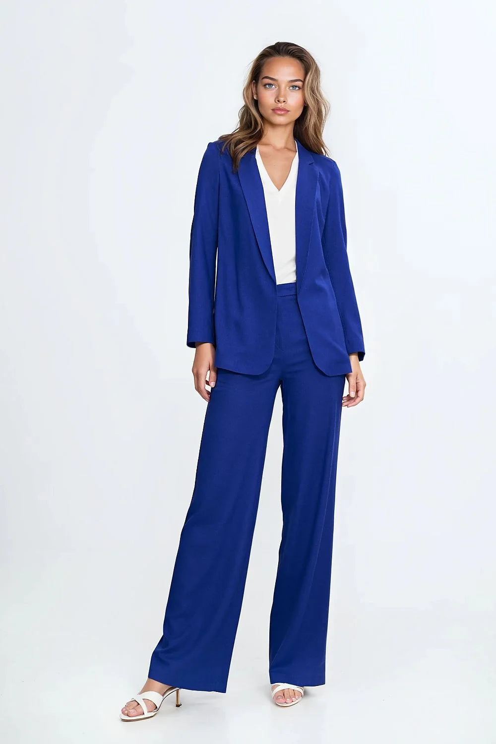 tailleur femme blazer long revers classiques sans boutons pantalon taille haute jambe large fluide bleu royal élégant moderne