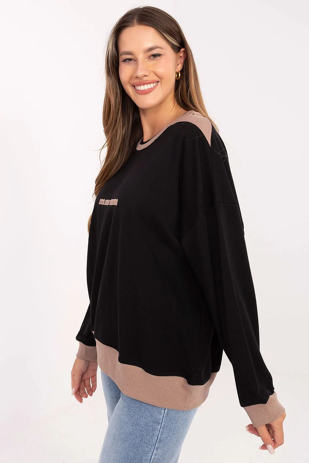 sweatshirt femme oversize col rond manches bouffantes épaules tombantes noir finitions côtelées taupe broderie centrale molletonnée coton polyester