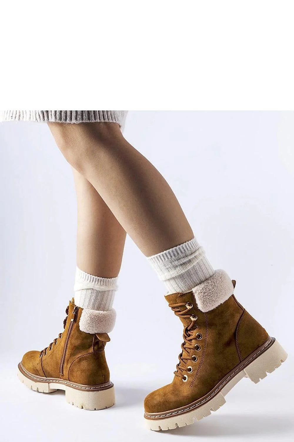 Bottes trappeur Solea pour femmes design fonctionnel élégant couleur brun caramel doublure fourrure synthétique semelle caoutchouc durable style casual chic idéales pour l'hiver