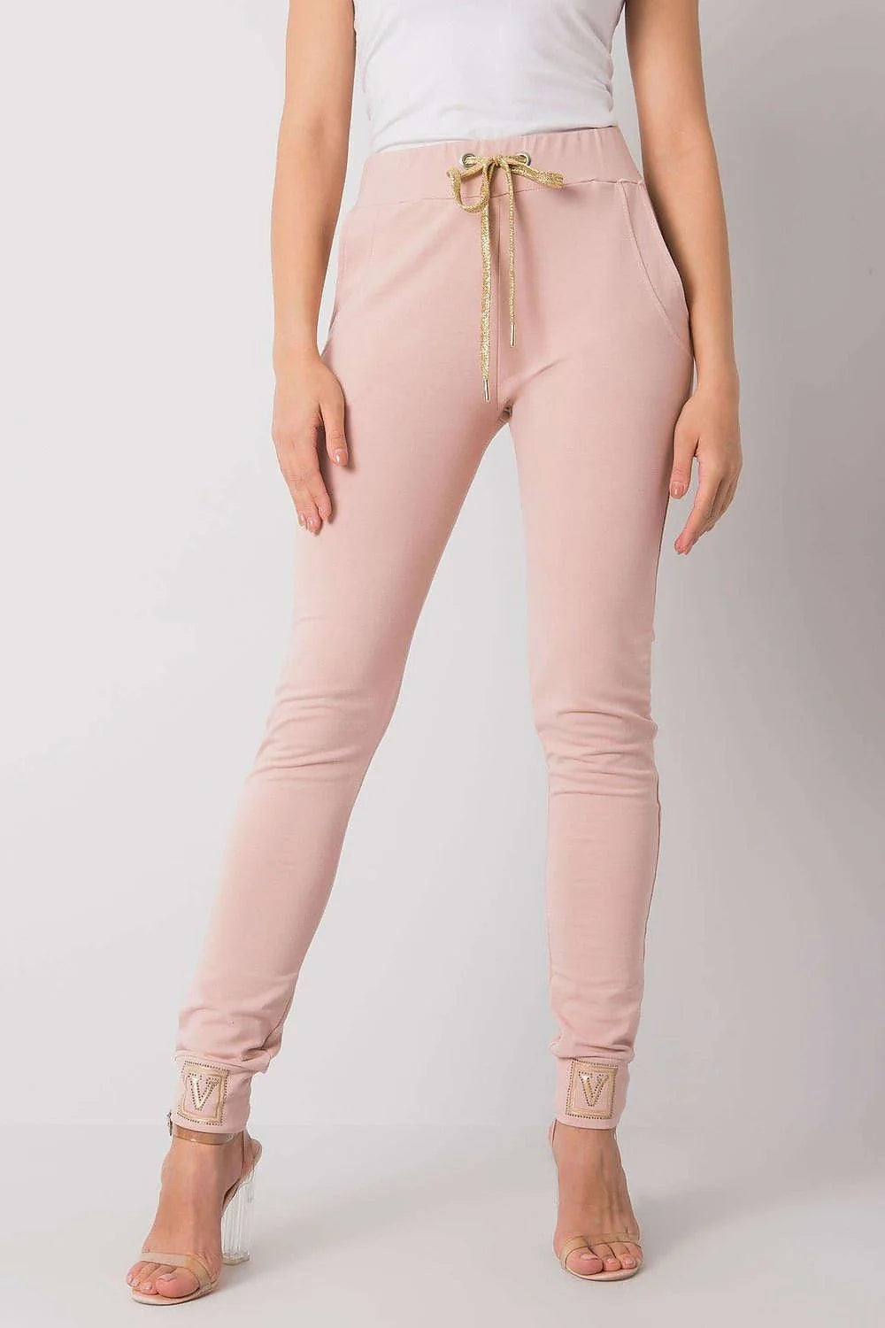 pantalon survêtement femme slim taillebasse fuselé chevilles resserrées rose poudré jersey stretch coton élasthanne poches latérales bande brodée