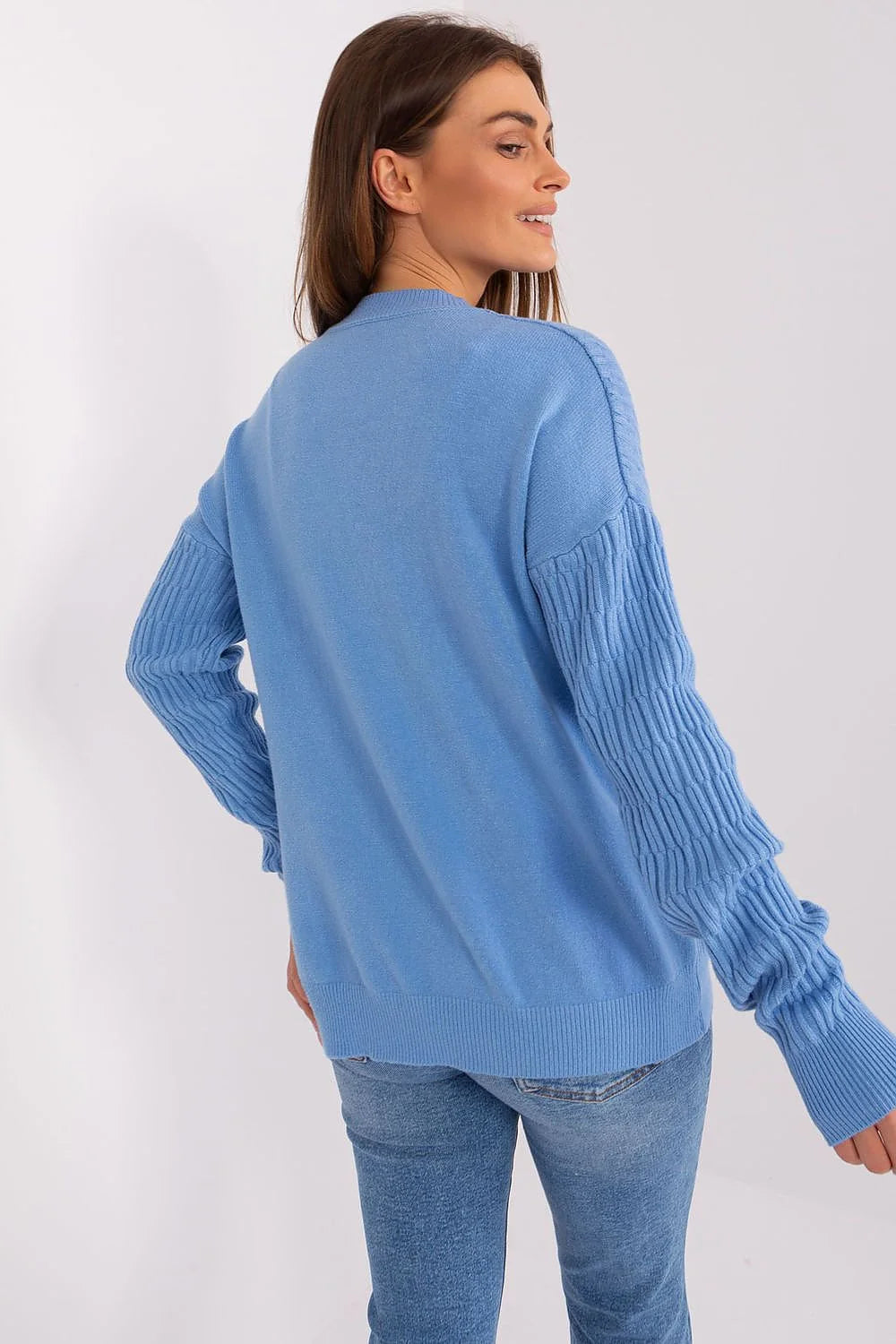 Pullover femme design moderne maille texturée bleu clair manches longues col rond automne hiver