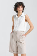 chemise sans manches viscose blanche fluide légère coupe ajustée col classique boutons discrets tombé net intemporelle élégante estivale