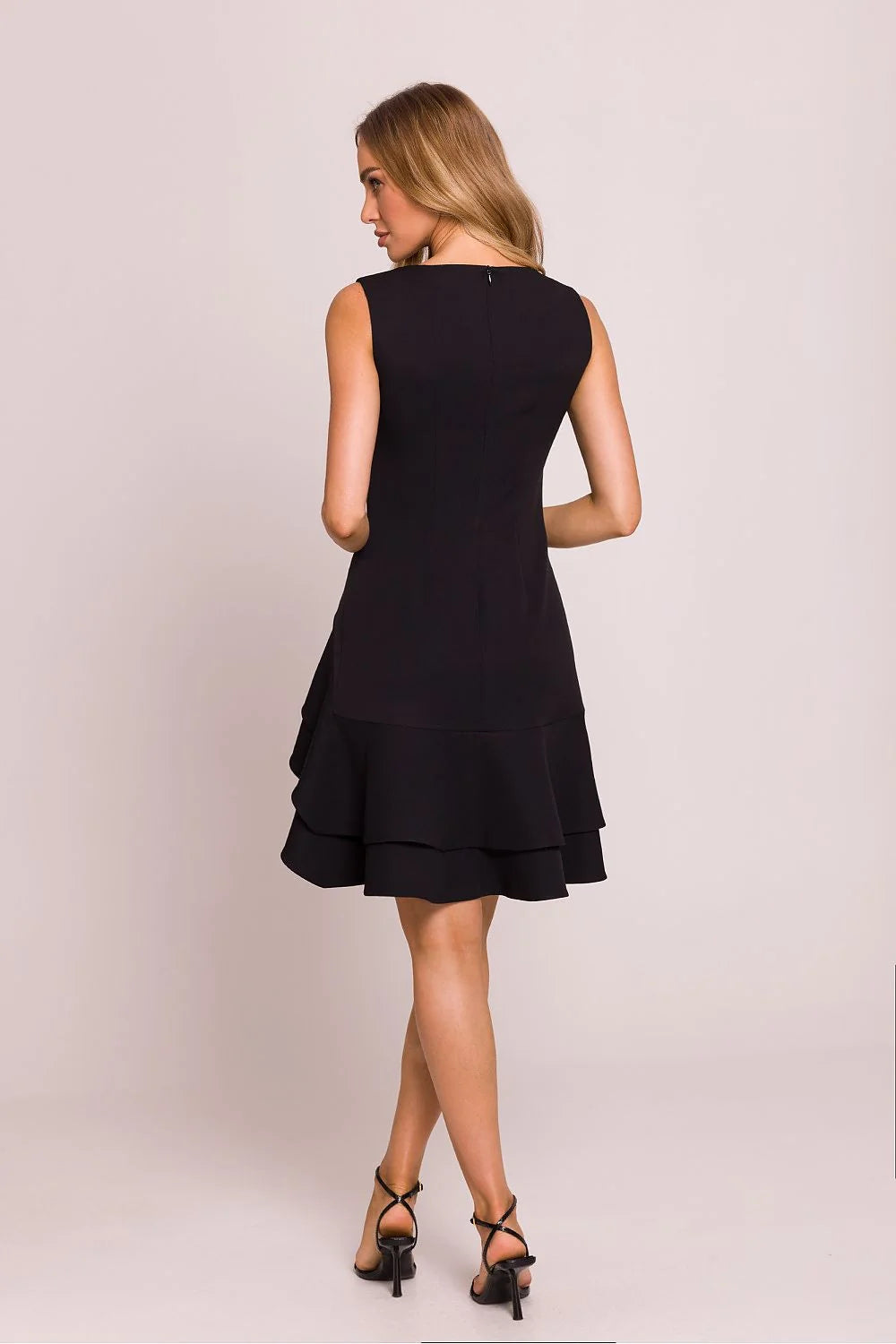 Robe de cocktail élégante noire sans manches asymétrique volants fente longue dos caché femme