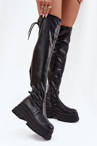 cuissardes similicuir noires plateforme massive semelle crantée chunky zip latéral cordon serrage bout rond doublure pied isolante antidérapante mode rock