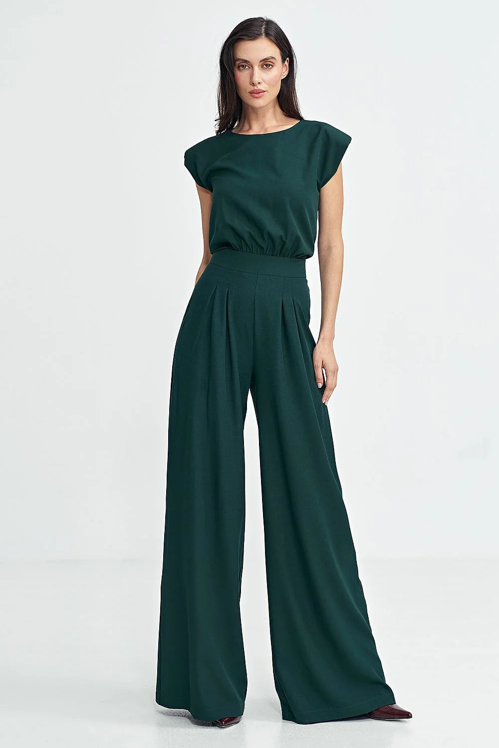 Combinaison pour femme élégante moderne design coupe ample jambes évasées vert profond matériau fluide occasion professionnelle soirées