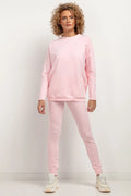 Ensemble survêtement Tessita coton polyester rose pâle ample minimaliste col rond manches longues legging ajusté confortable casual chic