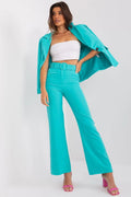 Ensemble femme chic modern design veste cropped pantalon évasé couleur turquoise haut bandeau blanc polyester spandex